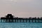 Wood pier jutting into tropical waters of gulf of mexico