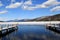 Wood piers on the melting waters of pretty lake