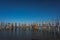 Wood pilings with blue sky ocean views