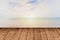 Wood plank with abstract of sea and sand with wave on blue sky background with copy space for place product