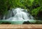 Wood platform beside the waterfall