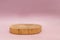 Wood podium on pink background for product presentation