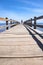 A wood pontoon access to paradise beach