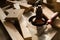 Wood products and tools lie on a workbench in a workshop