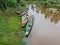 Wood rowboat on canal in Thailand