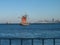 Wood sailing ship with tourists on board cruising across the bay