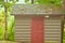 Wood shed filled with split firewood for a cabin