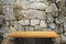 Wood shelf on stone wall