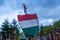 Wood shield in hungarian flag color in local memorial park