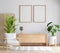 Wood sideboard in white living room with two picture frame mockup, 3D rendering