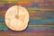 Wood slice cross section. Saw cut wood on a beautiful multicolored wood background