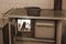 wood stove with fire in the kitchen with sepia effect