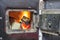 Wood stove firebox with fire and wood 2