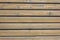 Wood surface with natural wood pattern. Wooden wall of the house, covered with varnish. Natural brown wood texture