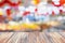 Wood table with abstract supermarket blurred background