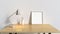 Wood table in white room and blank frame silver lamp 3d render interiors