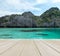 Wood Terrace on The Beach with Clear Sky, Crystal Clean and Clear Sea and Big Island in Myanmar in Scenery Background for Mock up