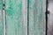 Wood texture, background with copy space. Old wooden barn green or emerald