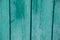 Wood texture, background with copy space. Old wooden barn green or emerald