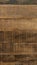 Wood texture background with rich colors. Orange, brown and dark tones. Stacked stripes of wood