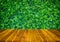 The wood texture and green leaf background