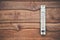 Wood thermometer calibrated in degrees celsius on the wooden wall, concept of weather.