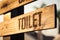 Wood Toilet Sign