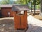 Wood trash can with roof