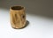 Wood turned varnished pot