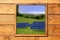 Wood window solar plates meadow view