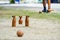 Woodball player on field with woodball gate and stick on competi