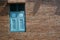 Woodden window  blue and old brick wall texture background