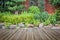 Woodecking or flooring and plant in garden decorative