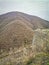 A wooded vally and road in the Highlands of near Kocani,