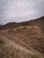 A wooded vally and road in the Highlands of near Kocani,