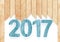 Wooden 2017 blue digits with wood planks