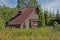 Wooden abandoned house in  forest windy weather