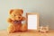 Wooden airplane toy and teddy bear over wood table next to blank photo frame. retro filtered image. ready to place photography