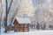 Wooden arbor in winter forest