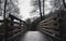 Wooden arch bridge on a cloudy day