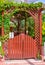 Wooden arch with wicket door in Chinese style