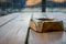 Wooden ashtray on a wooden table , closeup