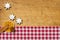 Wooden background with cookies and christmassy spices