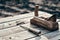 Wooden background. Jointer plane and chisel lies on the village table along with sawdust. Wood thread tool. solar lighting