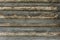 Wooden background of an old fashioned rustic cut log wall