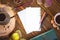 Wooden background with paper for notes, dairy, cofee, Ñezve, autumn leaves. Workplace top view