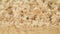 On a wooden background with sawdust shavings roll after woodworking