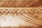 Wooden background of unpainted strips with decorative elements.