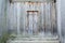 Wooden background. Weathered, ancient wooden door