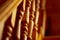 Wooden balusters on wooden railings on the stairs